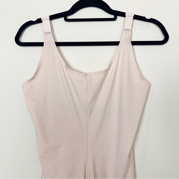 SPANX Thinstincts 2.0 Open-Bust Mid-Thigh
Bodysuit in Nude - Picture 7 of 13